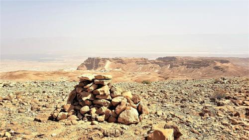 a pile of rocks on top of a mountain at Dead Sea Sun Guest House in Arad