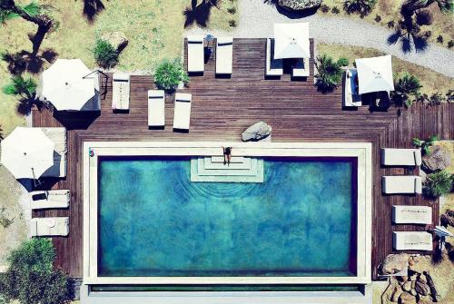 an overhead view of a swimming pool in a backyard at Vallegrande Nature Resort by Geocharme in Cefalù