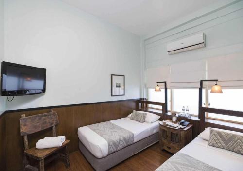 Ліжко або ліжка в номері Tanaya Bed & Breakfast