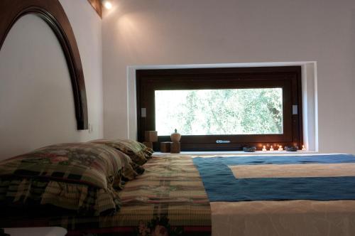Cama ou camas em um quarto em Agriturismo Villa Coluccia