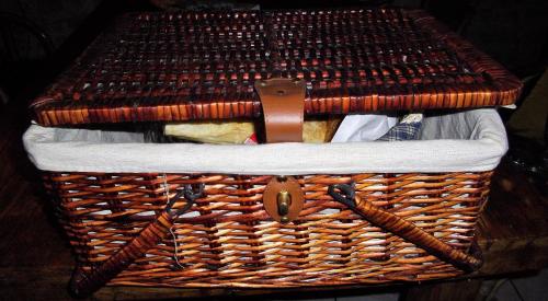a wicker basket sitting on top of a table at Maison du Moulin Galuzot in Saint-Vallier