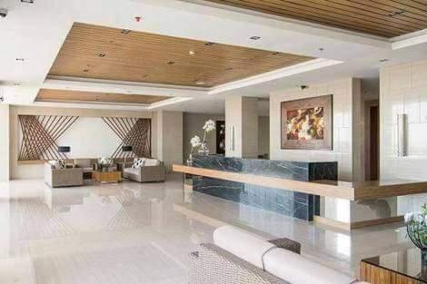 a large living room with a couch and a table at The Perfect Getaway in Tagaytay