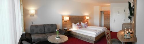 Postel nebo postele na pokoji v ubytování Höhenhotel & Restaurant Kalikutt