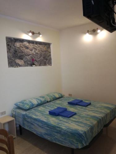 Postel nebo postele na pokoji v ubytování Appartamento Osnao