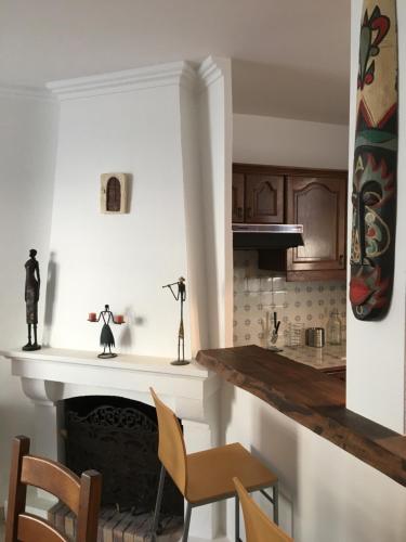 Η κουζίνα ή μικρή κουζίνα στο Le Triplex Gambetta