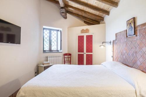 Postel nebo postele na pokoji v ubytování Il palmento dell'Etna