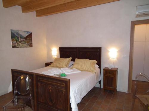 Cama o camas de una habitación en L'Isolo b&b e case vacanza