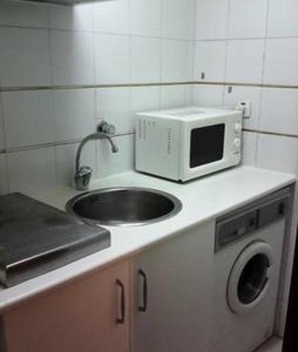Кухня или мини-кухня в Apartamentos Torr en Madrid - Chamartín
