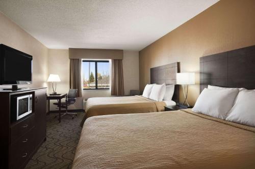 Katil atau katil-katil dalam bilik di Days Inn by Wyndham Columbia Mall