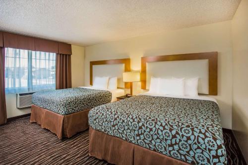 Ein Bett oder Betten in einem Zimmer der Unterkunft Days Inn by Wyndham Yakima
