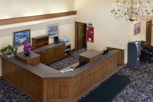 a court room with avertisementatronatronatronstrationstrationstrationstrationstration at Days Inn by Wyndham Grayling in Grayling