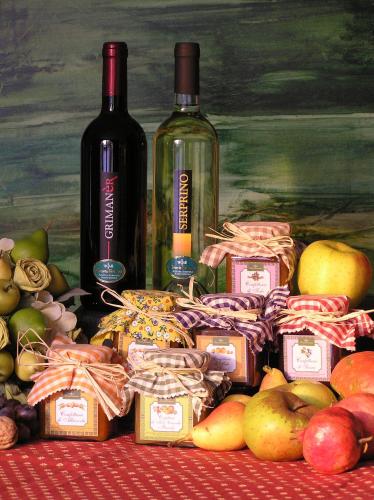 a painting of two bottles of wine and some apples at Fattoria Grimana in Montegalda