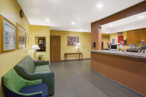 a waiting area of a hospital with a waiting room at Days Inn by Wyndham Fremont in Fremont