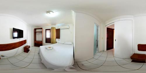 Kylpyhuone majoituspaikassa Residencial Ponta Negra Flat