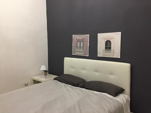 La Casa Nel Barocco tesisinde bir odada yatak veya yataklar