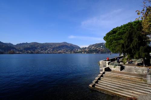 a view of a lake with a group of stairs at Locanda Milano 1873 in Brunate