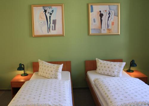 Кровать или кровати в номере "Zum Heiligen Geisthof"