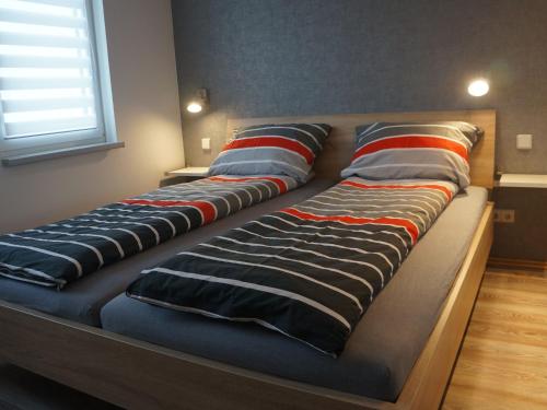 A bed or beds in a room at Charming Apartment in Malchow near Sea