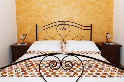 A bed or beds in a room at A Casa Di Silvia B&B