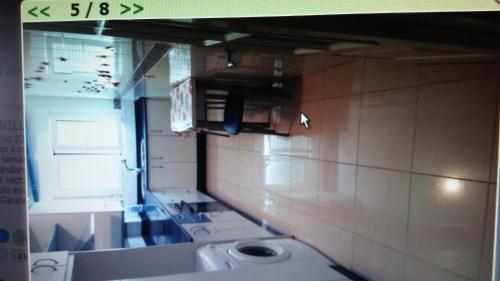a bathroom with a toilet in a room at Apartamento la romanilla a 200metros de la playa in Roquetas de Mar