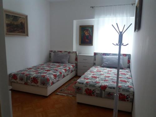 Ένα ή περισσότερα κρεβάτια σε δωμάτιο στο Bed&Breakfast INTERMEZZO CAFFE