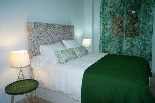 Cama o camas de una habitación en Apartamento Plaza Alfonso XII