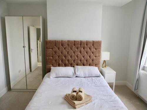 Кровать или кровати в номере Romford Road Cosy Room
