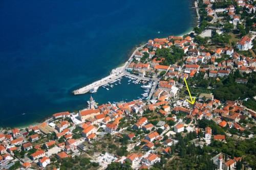 an aerial view of a town with a harbor at Luxury Apartment In The Old Palace in Sutivan
