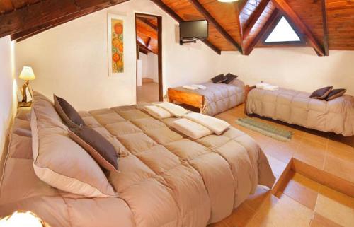 Postel nebo postele na pokoji v ubytování Hotel Boutique Spa & Sushi Posada de Campo-Solo adultos