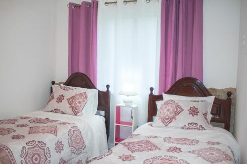 En eller flere senge i et værelse på Apartamento Sandra