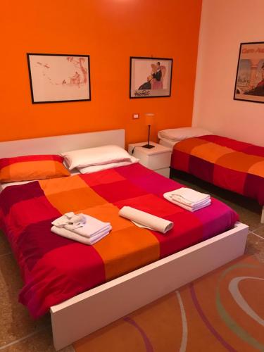 Lova arba lovos apgyvendinimo įstaigoje A Casa Di Giallo B&B
