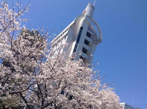 
a tall tower with a clock on top at Hotel A'bant Shizuoka in Shizuoka
