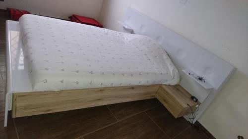 Кровать или кровати в номере Le Ngapatel Bungalow Thaï