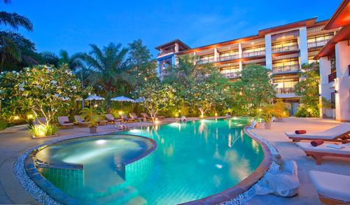 a swimming pool in front of a hotel at Le Murraya Boutique Serviced Residence & Resort in Chaweng