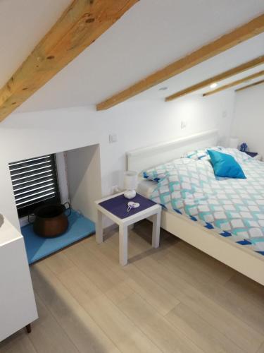 Postel nebo postele na pokoji v ubytování Apartment Vrbenka
