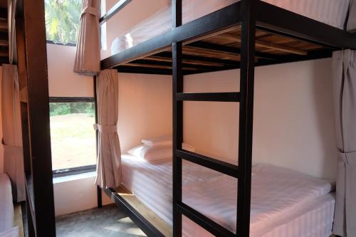 Postel nebo postele na pokoji v ubytování Lana Land Homestay Phu Quoc