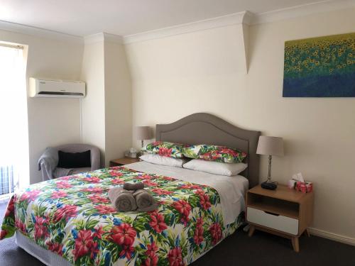Säng eller sängar i ett rum på Caulta Apartments