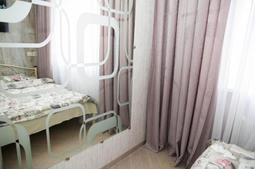 Een bed of bedden in een kamer bij Apartmets in the center of Kharkov