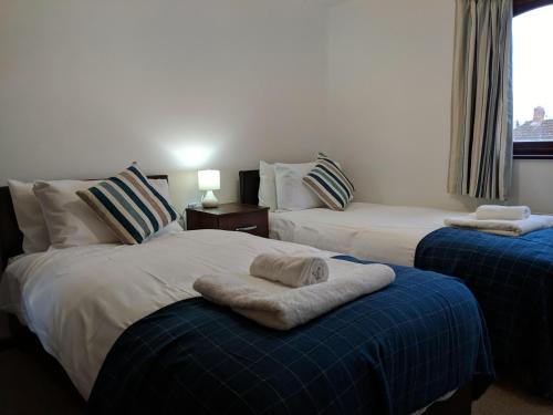 Cama o camas de una habitación en Kings Lodge
