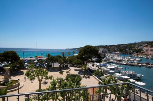 a view of a marina with boats in the water at Hotel Liautaud in Cassis