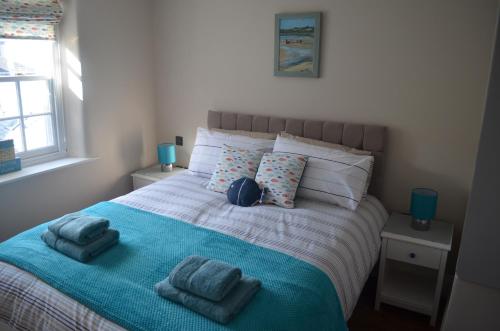 Cama ou camas em um quarto em Appledore Factory