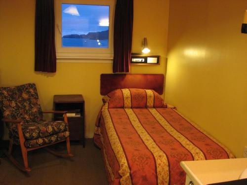 Postel nebo postele na pokoji v ubytování Lancaster Hotel
