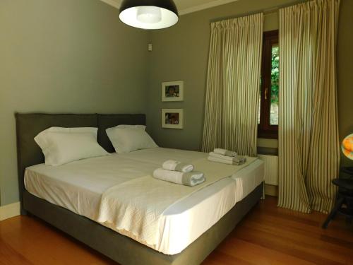 A bed or beds in a room at Anna's Mansion