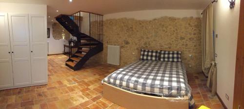 מיטה או מיטות בחדר ב-appartamento pescocostanzo