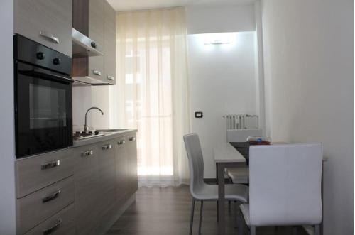 Kuchyň nebo kuchyňský kout v ubytování Vacanza Lago di Garda