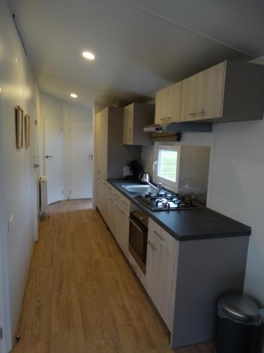 Dapur atau dapur kecil di Minicamping Zonnehoek