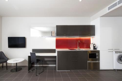 
A kitchen or kitchenette at Abode Woden
