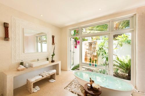 A bathroom at The Aiyana Resort & Spa