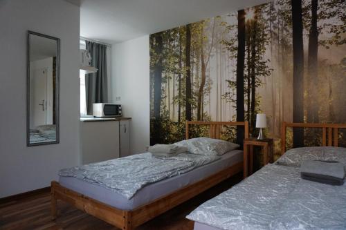 Postel nebo postele na pokoji v ubytování Mitte24