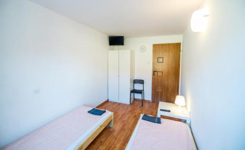 Cama o camas de una habitación en Noclegi WOKU
